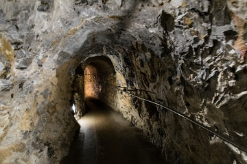 Wall Mural - Carved underground corridor.