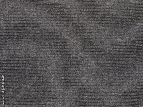 Fotografie, Obraz Texture detail of a dark gray acrylic polyester material blend is shown in a closeup view