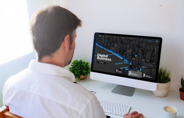 Wall Mural - man browsing digital business website on computer