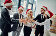 © Vasyl - Group of office workers celebrating Christmas