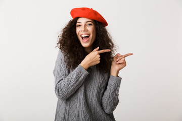 Wall Mural - Excited young woman wearing autumn clothes