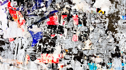 Old grunge ripped torn vintage collage street posters creased crumpled paper surface placard texture background backdrop