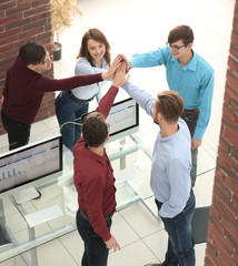 Canvas Print - Business people happy showing team work and giving five in offic