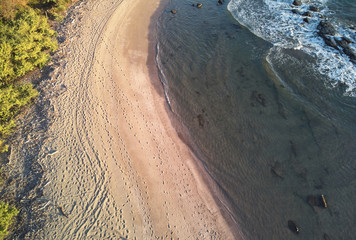 Wall Mural - People traces on ocean beach