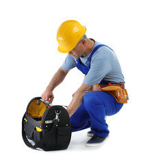 Poster - Electrician with tools wearing uniform on white background