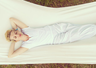 Sticker - young woman resting on hammock