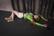 © Demian - Lifeless unconscious woman lying on a factory floor