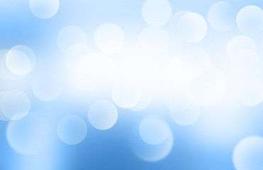 Wall Mural - Lights or blurred bokeh on blue gradient background