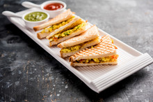 Paneer Bhurji Sandwich Is A Tasty Paneer Based Dish Made With Cottage Cheese.served With Fresh Tomato Ketchup And Green Mint Chutney. Selective Focus