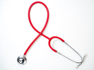 Red Stethoscope isolated on white background.