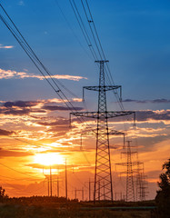 High-voltage power lines. Electricity distribution station. high voltage electric transmission tower. Distribution electric substation with power lines and transformers