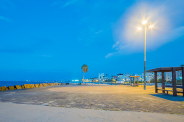 Wall Mural - Bat-Galim beach promenade, at sunset, Haifa