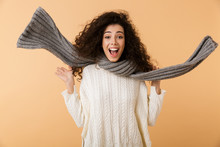 Cheerful Young Woman Wearing Winter Scarf