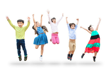 Wall Mural - happy kids jumping in air over white background