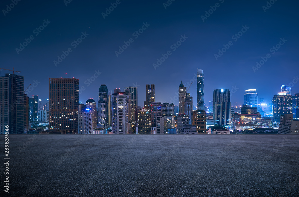 Bangkok urban cityscape skyline night scene with empty asphalt floor on front - obrazy, fototapety, plakaty 