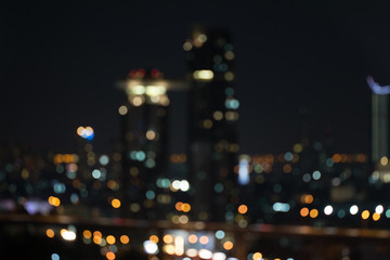 Canvas Print - defocused city night light blurred with bokeh abstract background.