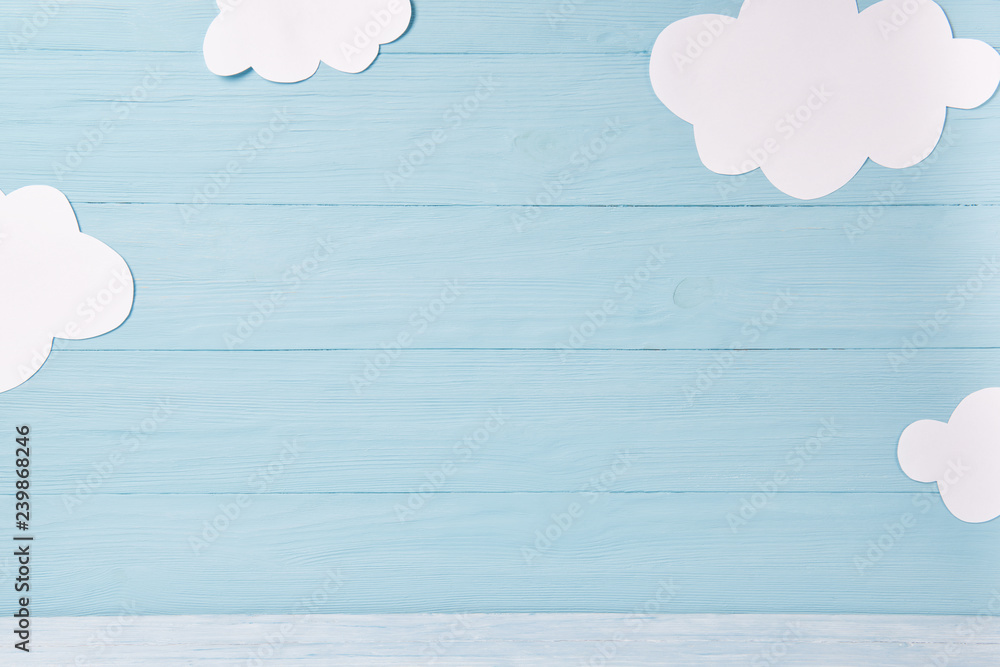 Cute children or baby background, white clouds on the blue wooden background - obrazy, fototapety, plakaty 
