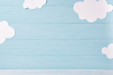 Cute Children Or Baby Background, White Clouds On The Blue Wooden Background