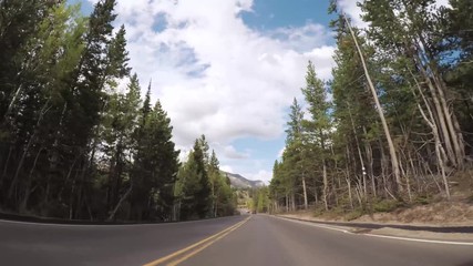 Sticker - Driving on paved road in Rocky Mountain National Park.
