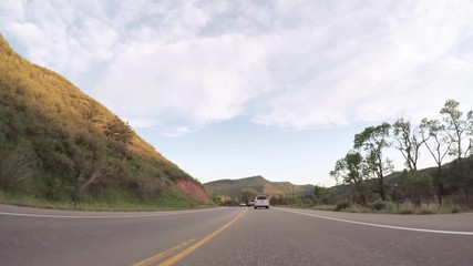 Autocollant - Driving on paved road in Boulder area.