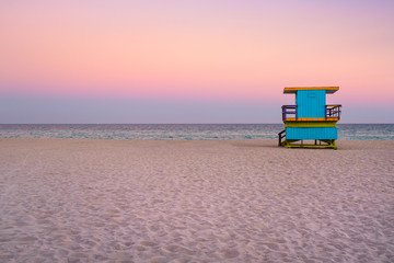 Canvas Print - Famous lifeguard tower at South Beach in Miami with a beautiful sunset sky