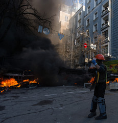 Wall Mural - Street riots, fire in the city, protests