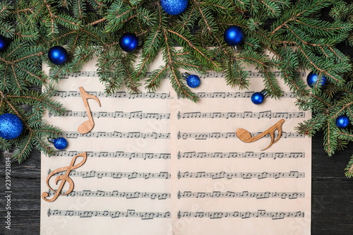 Composition With Wooden Music Notes And Decorations On Table Top