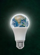 Planet Earth Inside LED Light Bulb With Copy Space