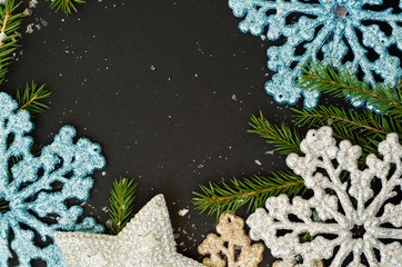 Wall Mural - Christmas background with shining snowflakes and stars.