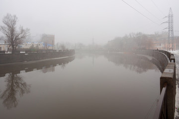  Fog at the river and the embankment
