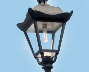 street lamp in front of blue sky