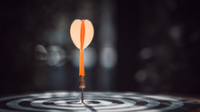 Bullseye Is A Target Of Business. Dart Is An Opportunity And Dartboard Is The Target And Goal. So Both Of That Represent A Challenge In Business Marketing As Concept.