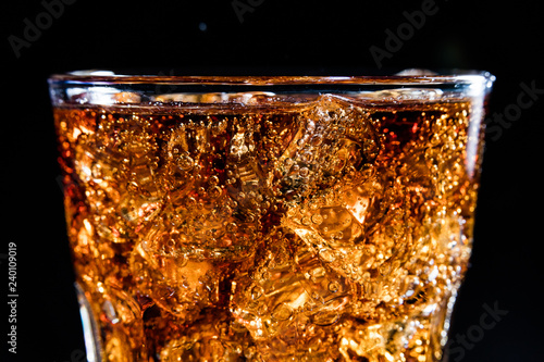 Fotografie, Obraz Glass with soft cola drink, ice and bubles