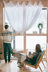 Wall Mural - Family rest in winter cabin