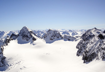 Poster - winter mountain landscape in the Silvretta mountain range in the Swiss Alps with famous Piz Buin mountain peak in the center