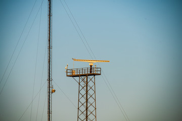 eletricity line poles and wires on blu sky