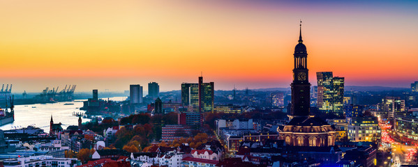 Panoramic aerial view of the harbor, St. Michael's Church (German: St. Michaelis) and downtown Hamburg, Germany.