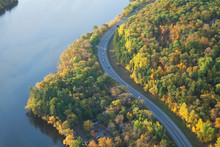 Aerial View Of Curving Road Along Mississippi River In Northern Minnesota During Autumn