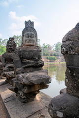 One of the Stone Asuras holding the nāga Vasuki on a bridge leading into the 12th century city of Angkor Thom.