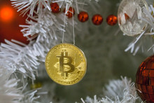 Bitcoin And Christmas, New Year Gold Bitcoin. Cryptocurrency Bitcoin On A Christmas Tree