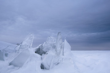 Wall Mural - a snowstorm on the surface of the frozen sea, the wind carries snowflakes through the ice floe.