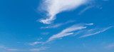 Fototapeta Na sufit - Blue sky with windy cirrus clouds at daytime