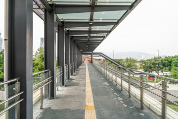 Wall Mural - Crossing pedestrian bridge