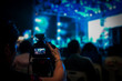 © Surachetsh - silhouette videographer had been recorded to blurred and bokeh countdown concert., Bangkok, Thailand.