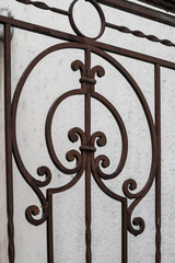 Wall Mural - Fragment of a wrought-iron gate with an openwork pattern