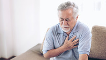 Senior Male Asian Suffering From Bad Pain In His Chest Heart Attack At Home - Senior Heart Disease