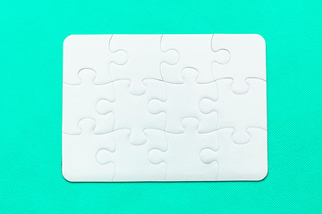 Jigsaw Puzzle with missing piece on mint background Top view