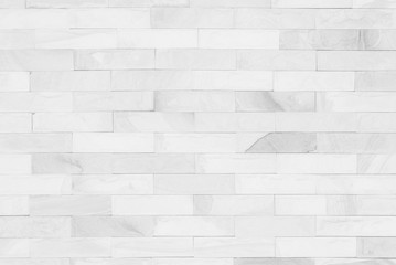 Wall Mural - White brick wall art concrete or stone texture background in wallpaper limestone abstract paint to flooring and homework/Brickwork or stonework clean grid uneven interior rock old.