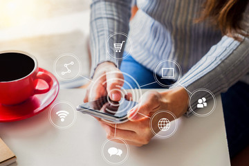 Women use smart phones for mobile payments, online shopping, omni channels, sit at virtual chairs, screen icons, screen graphics.