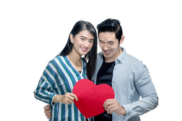 Sticker - Happy asian couple holding red heart together